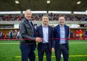 Ross Buchan, John Collins and Ryan Cass reopen the Netherdale stand in 2022. Photo: Thomas Brown