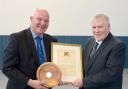 SBC Convener Watson McAteer presents Murray Whyte (Right) with Tweeddale's Citizen of the Year certificate