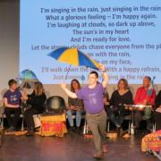 Jeremy Sceats dancing to Singing in the Rain in Peebles Player's prouction 'Wonderful Weather'