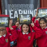 Pupils with iPads at the Inspire Learning festival 2022. Photo: SBC