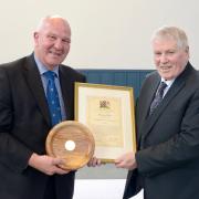 SBC Convener Watson McAteer presents Murray Whyte (Right) with Tweeddale's Citizen of the Year certificate