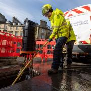 Engineer Shelley Lamont working on Scotland's new fibre network.