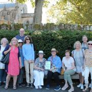 Abbotsford volunteers showcasing Investing in Volunteers award on trip to the Rosslyn Chapel
