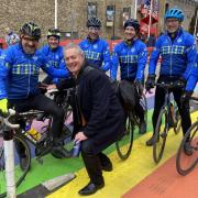 The Cycling Souters pictured with former Scotland rugby player Gavin Hastings in Cardiff