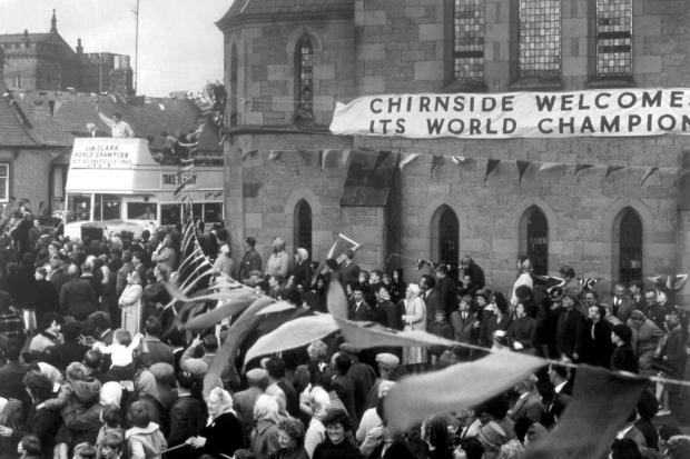 Huge crowds turn out in Chirnside to welcome the new World Drivers' Champion, Jim Clark, on his open-topped bus tour of Berwickshire towns.
