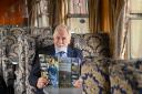 James Cosmo with the new VisitScotland Set in Scotland guide. Photo: VisitScotland/ Julie Howden