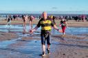 Jim takes the plunge into the North Sea at Spittal on Boxing Day