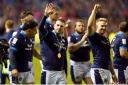 Scotland players celebrate after victory over Wales