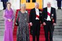 (left to right) Elke Budenbender, the Queen Consort, the King and German president Frank-Walter Steinmeier arrive at the state banquet at Bellevue Palace (Ben Birchall/PA)