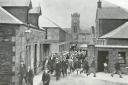 Workers leaving a mill. Photo: Peebles Civic Society