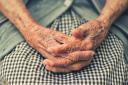 A photo of an elderly person's hands