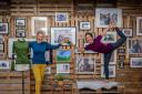 FINDRA founder Alex Feechan, left, and yoga instructor, Pollyana Caldas Xavier Leaver, strike a pose to celebrate the launch of the new café and community space on Innerleithen High Street. Photograph by Phil Wilkinson