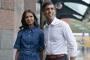 Prime Minister Rishi Sunak and wife Akshata Murty arriving in Manchester on the eve of the Conservative Party conference (Stefan Rousseau/PA)