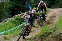 France's Hugo Pigeon (front) in action in the Men's Elite E-MTB Cross-Country race Photo PA Wire