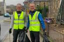 Denis Robson and Murray Charters collecting litter