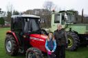 Tractor run raised money for the Children’s Hospice Association Scotland. Frank Mackenzie and granddaughter Gemma, left