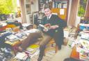 Bill McLaren at home in his study