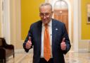Senate majority leader Chuck Schumer gives two thumbs up as the Senate votes to approve a 45-day funding bill to keep federal agencies open (Andrew Harnik, AP)