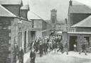 Workers leaving a mill. Photo: Peebles Civic Society