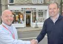 Shop manager Ronnie Cameron and Tweeddale West Councillor Dr. Drummond Begg