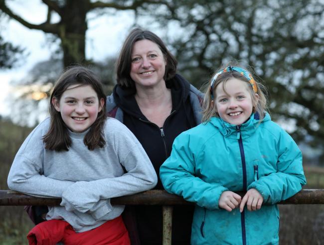 Annie and Ellen Allan with their mum Ruth, have all been taking part in the walks to raise money for Shelter. Photo: Helen Barrington