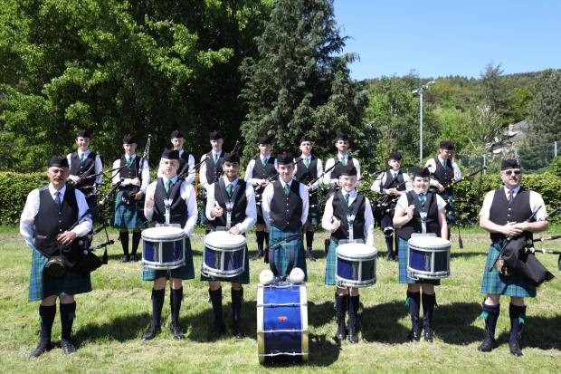 Peeblesshire News: City of Edinburgh Schools Pipe Band in Innerleithen. Photo: Helen Barrington