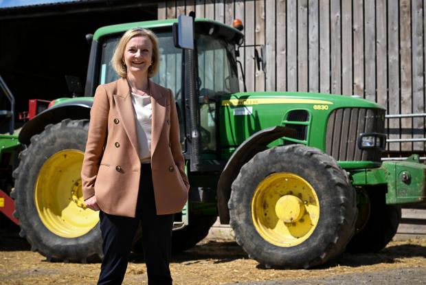 Peeblesshire News: Liz Truss, during her visit to Twelve Oaks Farm in Newton Abbot, Devon, as part of her campaign to be leader of the Conservative Party and the next prime minister. Picture date: Monday August 1, 2022.