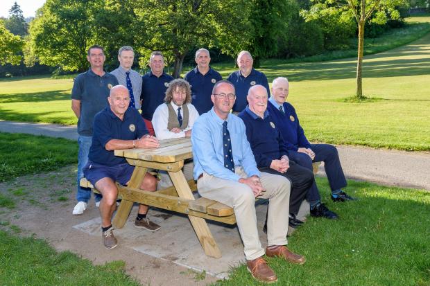 The Peebles Callants Club with one of its new benches. Photo: Stephen Mathison