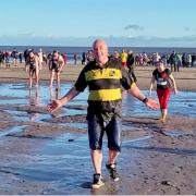 Jim takes the plunge into the North Sea at Spittal on Boxing Day