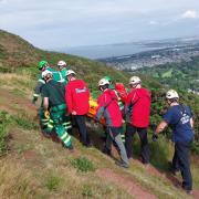 Tweed Valley Mountain Rescue team help evacuate a female casualty from Arthur's Seat