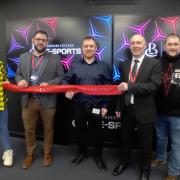 (L-R) Courtney Ferguson (student), Dale Clancy (Head of sector for business, computing, core skills, esol & creative industries), James Hood (CEO for Esports Scotland), Pete Smith (college principal) and James Brown (student)