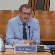 NHS Borders chief executive  Ralph Roberts, photographed speaking at a committee meeting