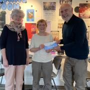 The winner of the NorthLink Ferries prize, in partnership with Tweed Theatre was Kathleen Alexander (centre), with Jean Westwater (left) and Paul Taylor (right). Photo: Tweed Theatre