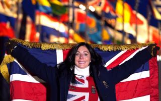Team GB flag bearer Eve Muirhead poses for a picture in the Olympic Village ahead of the Beijing 2022 Winter Olympic Games in China. Credit: PA